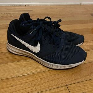 Nike Men’s Dark Blue Athletic Sneakers with White Swoosh